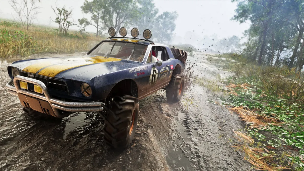 A raised Dominator buggy on a muddy track